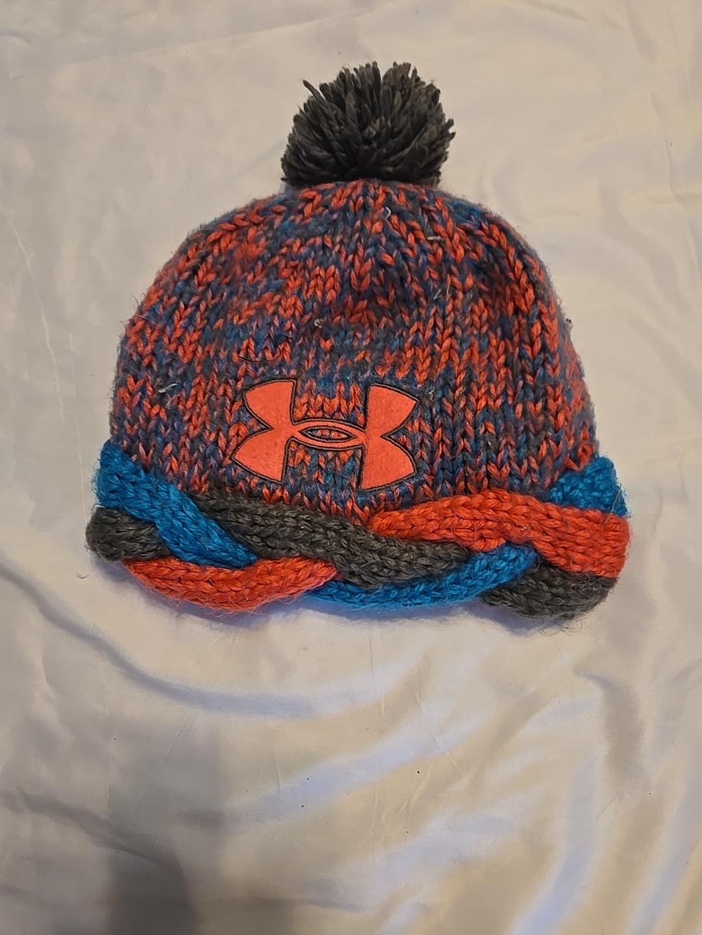 Under Armour Kids Pom Knit Beanie in Red, Blue & Gray